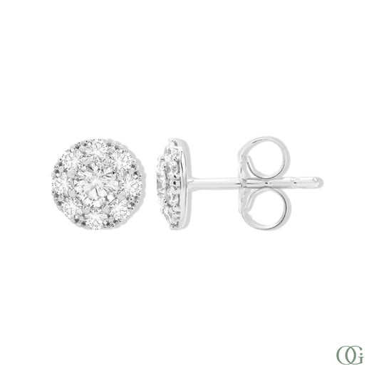 White gold earrings with clear gemstones on a white background